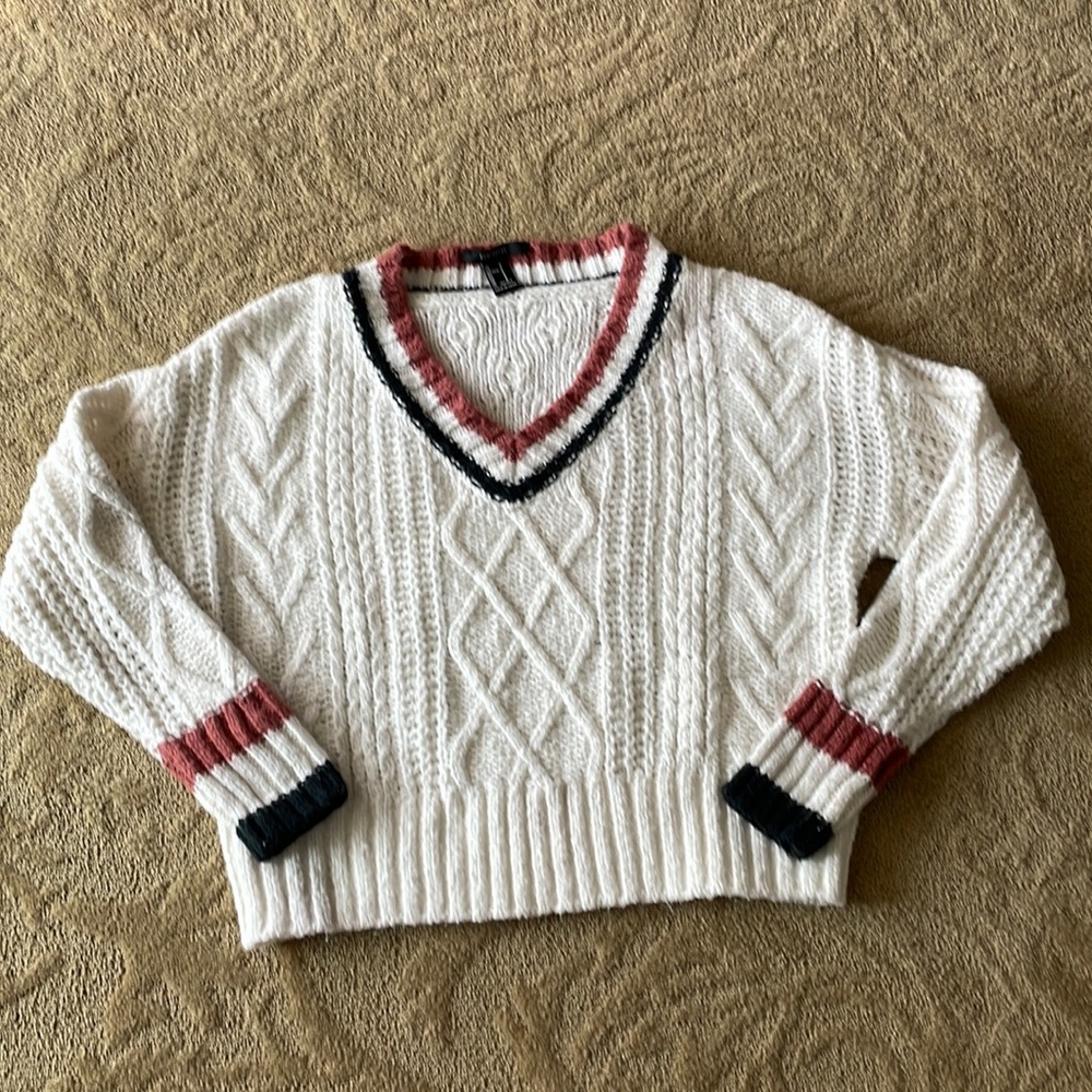 Cute ,preppy braided sweater. Looks like brandy Melville.